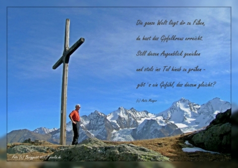 Wanderer am Gipfelkreuz - Fotogedicht